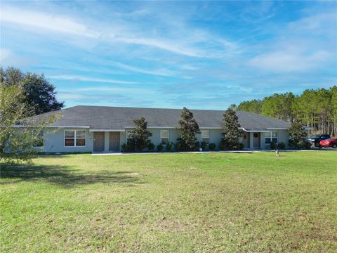 Photo of 159 Juniper Loop, Ocala, FL 34480 (MLS # OM715663)