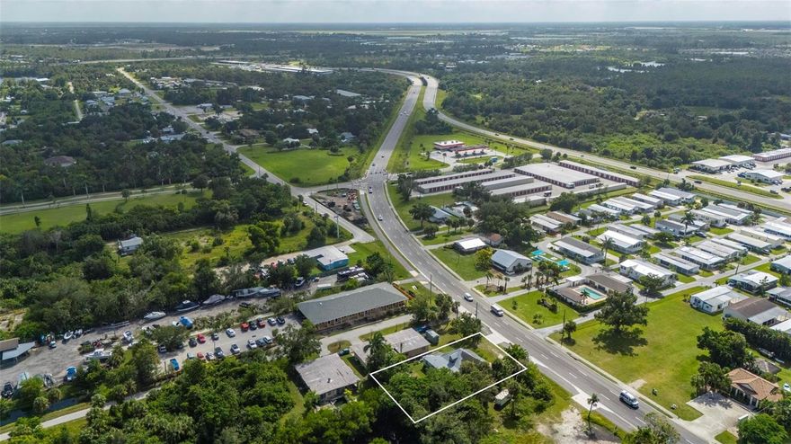 .30 acres with direct Highway 17 / Marion Avenue frontage in downtown Punta Gorda. Zoned CG (General Commercial), the property supports a variety of permitted uses and offers excellent visibility in a high-traffic corridor. Designated Commercial in the county’s future land use plan, it’s ideally positioned for development. Plus, canal frontage leading directly out to the Peace River into Charlotte Harbor. Building on property is a tear down due to damage. Convenient access to I-75 at Exit 164 provides quick connections to Fort Myers, Sarasota, and surrounding areas.