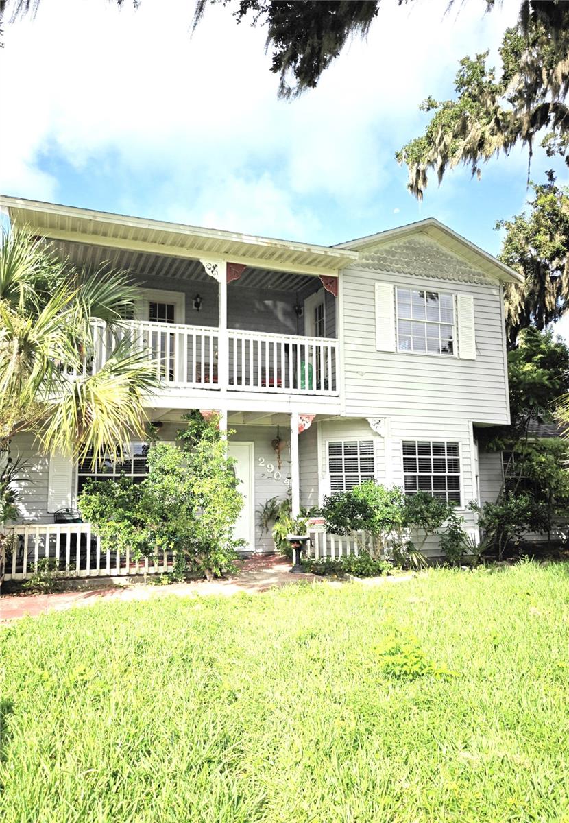 Ask about this Edgewater gem — 4 bedrooms, 2 baths, and 1,696 sq ft of solid living space. New A/C (2023), washer/dryer (2024), and roof from 2022. Large private lot backs to woods with peaceful surroundings. Highly private lot — plenty of space and silence around the home. Beautiful fireplace adds character. Perfect for those ready to refresh and make this house their home. Schedule your showing today with this price it would not stay long . This single-family residence is ready for someone who sees its potential. While it needs a bit of TLC to bring out its best, many of the heavy lifts are already handled: major systems like A/C and roof are relatively new, and essential appliances have been updated. With some cosmetic refresh, it’s a solid opportunity in Edgewater. The home does have an in-ground pool.
It has a fenced backyard which adds privacy and containment.
There is also a 10×18-tiled back porch adjacent to the pool/backyard area, which is great for outdoor entertaining.