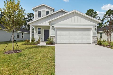 Photo of 38 Derbyshire Drive, Palm Coast, FL 32164 (MLS # O6320762)