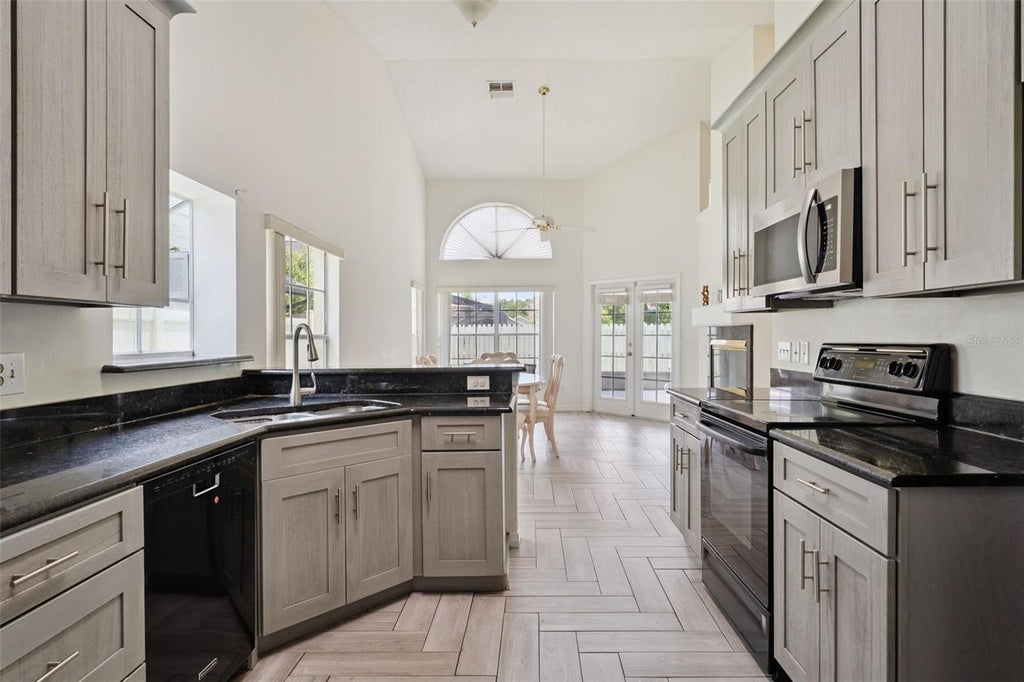 Photo of 14532 Musket Fire Lane, Orlando, FL 32837 (MLS # O6422804)