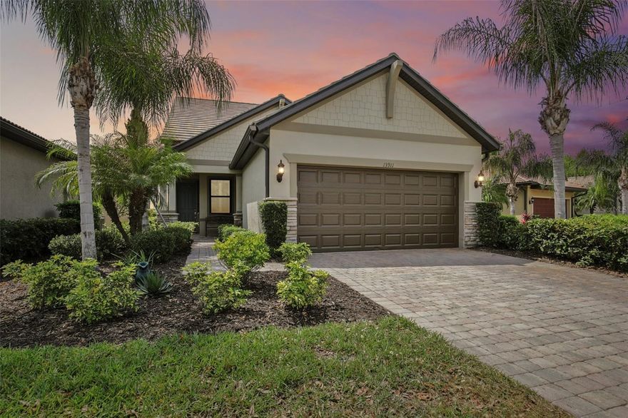Welcome to this beautifully positioned Taft model, perfectly situated along the water and offering an ideal blend of value, flexibility, and Florida lifestyle living. This 3-bedroom home features a versatile bonus room ideal for a home office, den, or creative space-along with a split floor plan for added privacy. The owner's suite offers a walk-in closet and a spacious walk-in shower. Upstairs, a private retreat with its own living area and full bath provides the perfect setup for guests. The kitchen is both stylish and functional, featuring granite countertops, stainless steel appliances, pendant lighting, ample cabinetry, and a large island for gathering. Step outside to the lanai and enjoy peaceful water views-perfect for relaxing or entertaining. Additional highlights include hurricane shutters and two newer A/C systems. Located in the highly sought-after IslandWalk community, residents enjoy maintenance-free living with lawn care, WiFi, and 24-hour security included. Resort-style amenities feature pools, pickleball, tennis, clubhouses, and a full calendar of social activities all just minutes from downtown Venice and the Gulf beach.