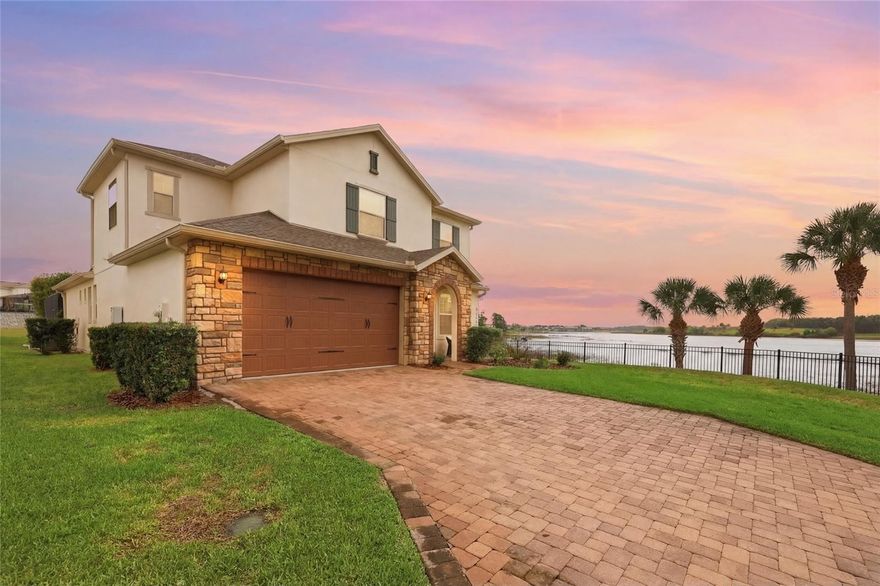 Lake Views Without the Lakefront Price! Welcome to your own slice of the Florida Dream—where tranquil lake views, thoughtful design, and resort-style outdoor living come together beautifully here in Winter Garden.

Nestled at the end of a quiet cul-de-sac and perfectly positioned to capture stunning views of Lake Avalon, this exceptional home offers a rare opportunity to enjoy the peaceful ambiance of lakefront living—without the premium price tag or additional tax burden. From the moment you step inside, you’re greeted by light-filled spaces and breathtaking water views showcased from the office, dining room, kitchen, living room, and upstairs bonus room.

Designed with both comfort and functionality in mind, this spacious residence features 4 bedrooms, 3.5 bathrooms, and a highly desirable main-floor primary suite—creating the perfect blend of privacy and convenience. The main living areas are anchored by beautiful tile flooring, while upstairs you’ll find brand new luxury vinyl plank flooring and fresh interior paint, offering a clean, modern feel throughout.

At the heart of the home, the gourmet kitchen is built for both everyday living and entertaining. It features granite countertops, a substantial island with bar seating, built-in oven and microwave, upgraded pendant lighting, and a beautiful gas cooktop with range hood. The open-concept layout flows effortlessly into the living and dining spaces—perfect for hosting gatherings, game days, or simply enjoying the peaceful lake views and wildlife just beyond your windows.

Tucked away and overlooking the pool, the main-floor primary suite offers a private retreat with a modern walk-in shower, dual sinks, and a spacious walk-in closet.

The dedicated front office is filled with natural light and offers a versatile space for working from home, morning coffee, or even catching a rocket launch on the horizon.

Upstairs, an expansive bonus room with lake views provides the perfect flex space for a media room, playroom, or second living area, complemented by three additional bedrooms and two full bathrooms, including an en-suite guest room.

Step outside to your own private Florida lakeside retreat. The expansive L-shaped lanai overlooks a sparkling saltwater pool and spa, creating the ideal setting for relaxing evenings, entertaining guests, or enjoying year-round outdoor living. With no rear neighbors, thoughtful landscaping, and Lake Avalon just beyond, this backyard truly feels like a private oasis.

Whether you’re hosting, unwinding, or working from home with a view, this property delivers a lifestyle that is both elevated and effortlessly comfortable.

Homes like this—where location, upgrades, and lifestyle align—are a rare find. Conveniently located near Winter Garden Village, top-rated schools, dining, major highways, and Central Florida attractions, this is one you won’t want to miss!