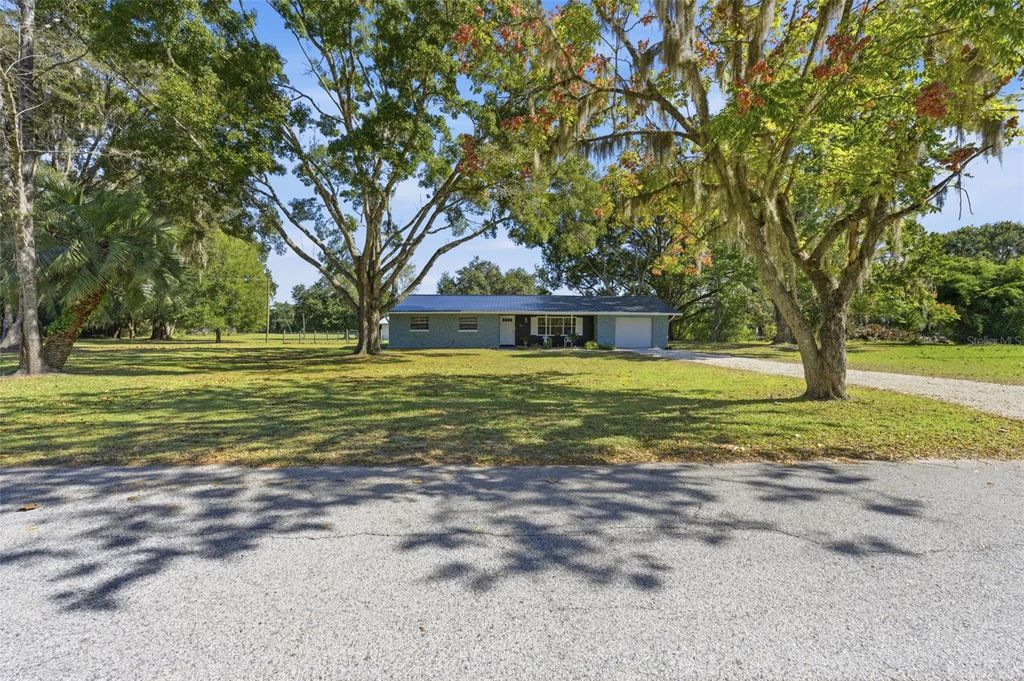 Photo of 8066 Redbud Lane, Brooksville, FL 34601 (MLS # W7880700)