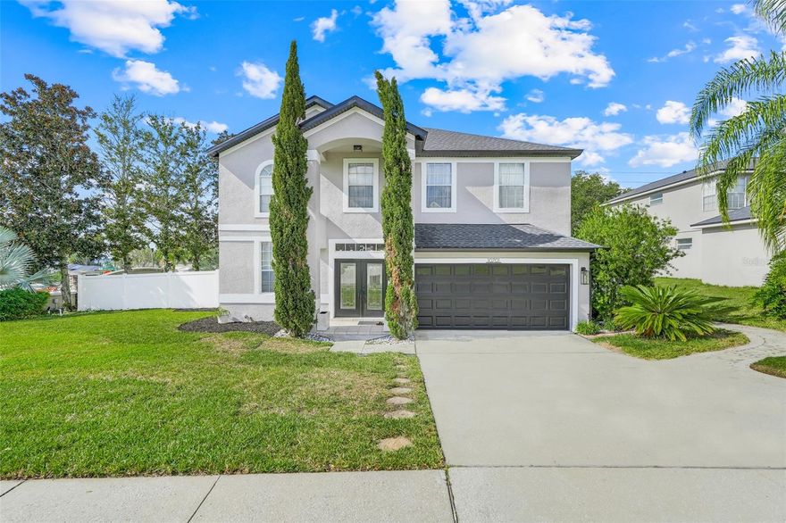 This beautifully maintained 4-bedroom, 2.5-bath home has been lovingly cared for and thoughtfully updated throughout. You’ll immediately notice the warm, modern touches — from stylish flooring and fresh paint to updated lighting and fixtures that make every room feel inviting. The open-concept living area flows into a bright, modern kitchen featuring granite countertops, stainless steel appliances, and ample cabinet space — perfect for everyday living and entertaining. The spacious primary suite offers a relaxing retreat with a beautifully updated en-suite bath, generous closet space, and an extended sitting area ideal for reading, a workspace, or a cozy lounge nook. Additional bedrooms are well-sized and versatile, ideal for family, guests, or a home office. Step outside to a private backyard featuring an extended paver patio and low-maintenance artificial turf — perfect for entertaining, relaxing, or enjoying the outdoors year-round. Conveniently located near shopping, dining, top-rated schools, and major highways, this home is just minutes from the 429 and close to the exciting new Olympus community — offering a wonderful combination of comfort, style, and a prime location in Clermont’s growing area.