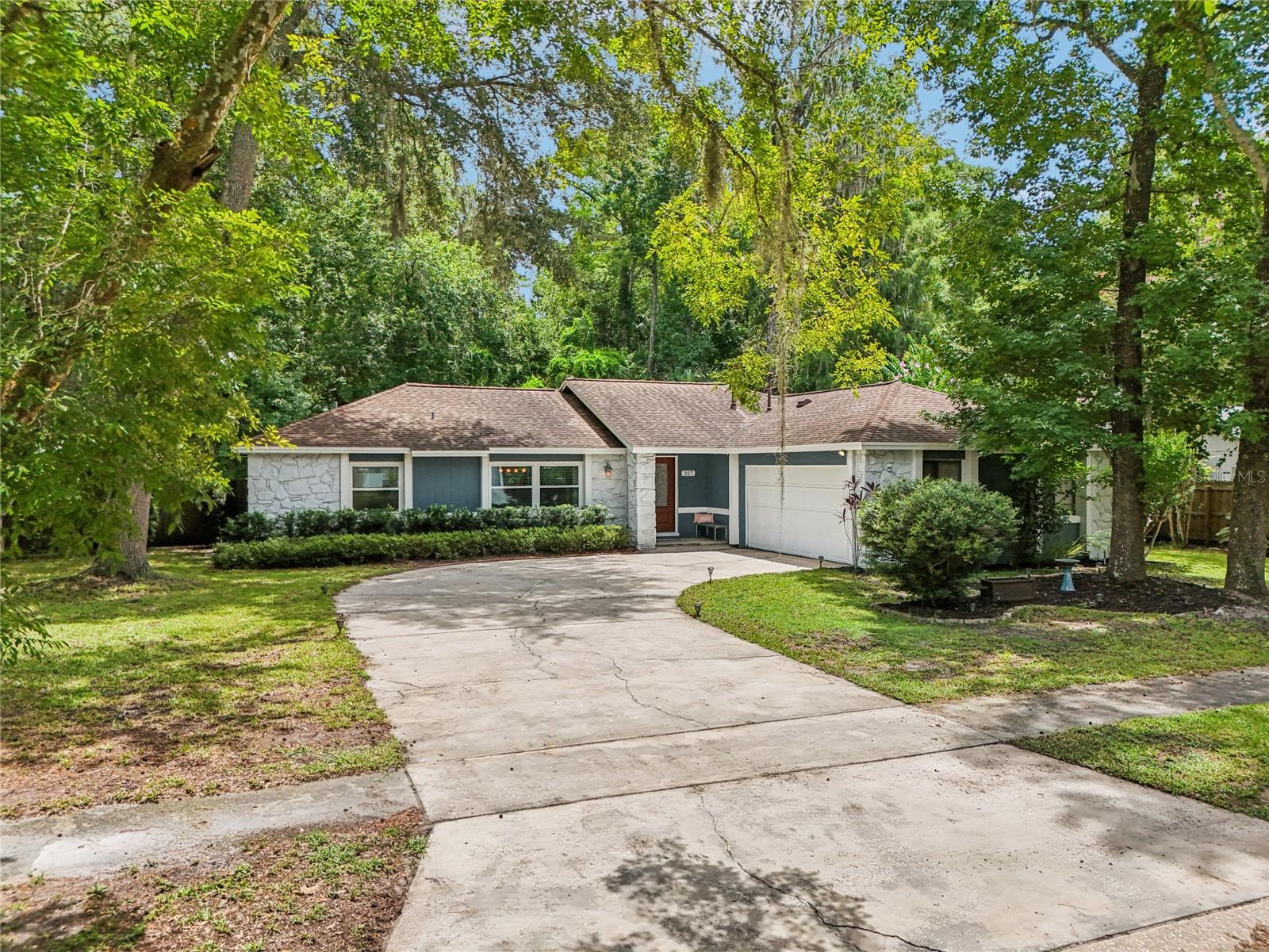 No HOA • Updated Pool Home on Over Half an Acre with Privacy and Upgrades!
Welcome to 227 Holiday Ln – a beautifully updated 3-bedroom, 2-bath home offering over 1,700 square feet of living space on a generous half-acre lot with no rear neighbors. Tucked away on a quiet street in Winter Springs, this home provides rare privacy thanks to a large wooded area on the property.
Enjoy your own resort-style retreat featuring a screened, resurfaced pool (2024) with new pump and filter (2024)—perfect for relaxing or entertaining. Inside, the kitchen was renovated in 2023 with soft-close cabinetry, modern finishes, and a layout designed for everyday comfort. The home also includes new energy-efficient windows and doors (2022), bringing in natural light while enhancing efficiency.
The open-concept living area with vaulted ceilings creates a spacious and airy feel, while the split-bedroom floor plan offers privacy for the primary suite. Outside, the fully fenced yard is ideal for pets, play, or gardening—plus, there’s no HOA, so you can enjoy the space your way.
If you’re looking for peace, space, and thoughtful upgrades in a convenient location, this home checks all the boxes.