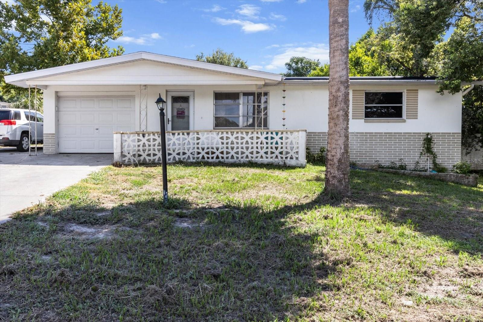 Discover this well-maintained 2-bedroom, 2-bath home with a 1-car garage, ideally located in desirable Beverly Hills—just off Hwy 491 and minutes from shopping, dining, medical offices, and more. Situated on a corner lot, this home features durable tile flooring throughout, NEW HVAC in 2020, stainless steel appliances, wood cabinetry, a newer drain field, and a roof replaced in 2013. Home includes a storage shed, expanded parking, and SOLAR panels to help lower your electric bills—an energy-efficient bonus you’ll appreciate year-round! The spacious Florida room features its own entrance and full bathroom, making it a versatile space—ideal as a third bedroom, master suite, home office, or even a potential in-law suite (simply add a closet!). Looking for a vacation home? You may have just found it!