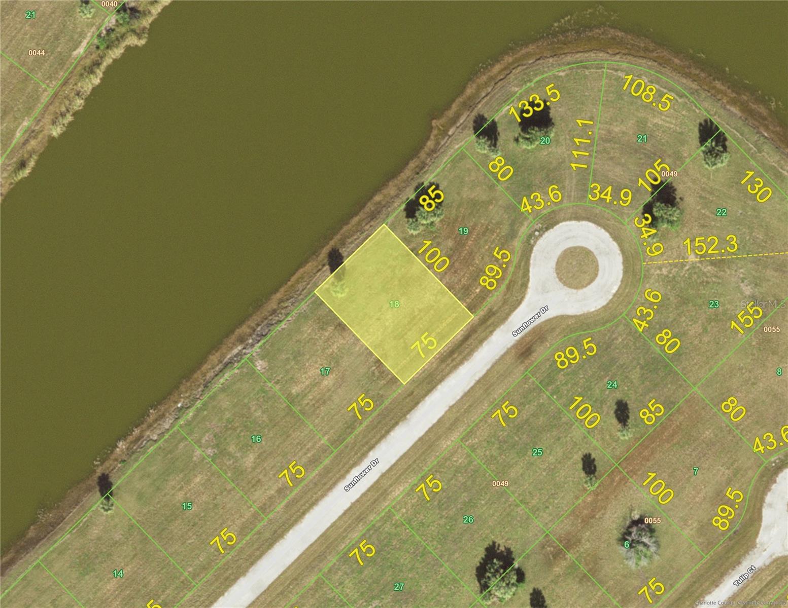 Nice fresh water lake to the rear! This building lot is in Rotonda Meadows, a community located on the Cape Haze Peninsula in Southwest Florida! This cleared property is on a small cul-de-sac! This lot does have city water and city sewer already in place!! This location is just south of – South Gulf Cove and minutes east of Gasparilla Rd. Enjoy this deed restricted community. Located 12 miles from The Boca Grande Lighthouse (the most southern tip of Boca Grande), with Englewood beaches 15 miles to the northwest! Great private location, close to HWY 771, and just southeast of Rotonda where you will find many Holes of Golf to choose from! RMD 000 0049 0018