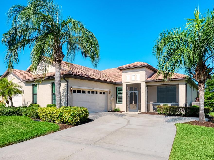 Experience resort-style living at Venetian Falls in this immaculate Botticelli paired-villa! Located in an active, gated, 55+ community, this home offers peace of mind with impact windows and front door, reinforced garage door, and storm shield for the lanai—all providing extra protection and energy efficiency. Enjoy relaxing or dining outdoors on your lanai overlooking the serene, long lake views. Inside, the kitchen offers a bright, open layout with stainless steel appliances, granite countertops, 42” wood cabinets, skylight, dinette, and pantry. Further features include a screened front entry and sitting area, updated primary suite, crown molding, plantation shutters, skylight in the living room, and wood laminate floors in the main living areas, den, and guest bedroom. The oversized 2-car garage has a durable polyaspartic garage floor finish adding a clean look and ease of maintenance. Meticulously maintained and boasting excellent curb appeal, this villa is truly move-in ready. Venetian Falls offers resort-style amenities including a clubhouse with full-time activity director, heated lap pool, heated resistance pool, fitness center, billiards, bocce, on-site management, and so much more! The HOA fee covers lawn care and front shrub trimming, irrigation, roof cleaning, exterior paint, internet, and basic cable. Don't miss out on this beautiful, worry-free home in a gated community just minutes from Venice beaches, dining, and shopping!