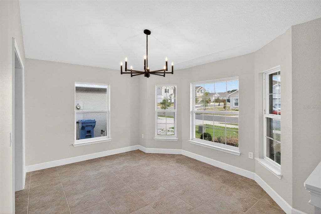 Photo of 683 Tanaro Lane, Haines City, FL 33844 (MLS # TB8505645)