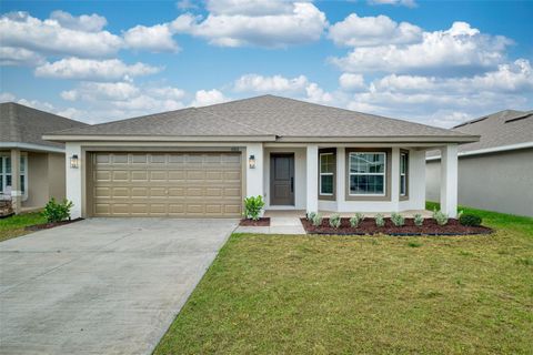 Photo of 683 Tanaro Lane, Haines City, FL 33844 (MLS # TB8505645)