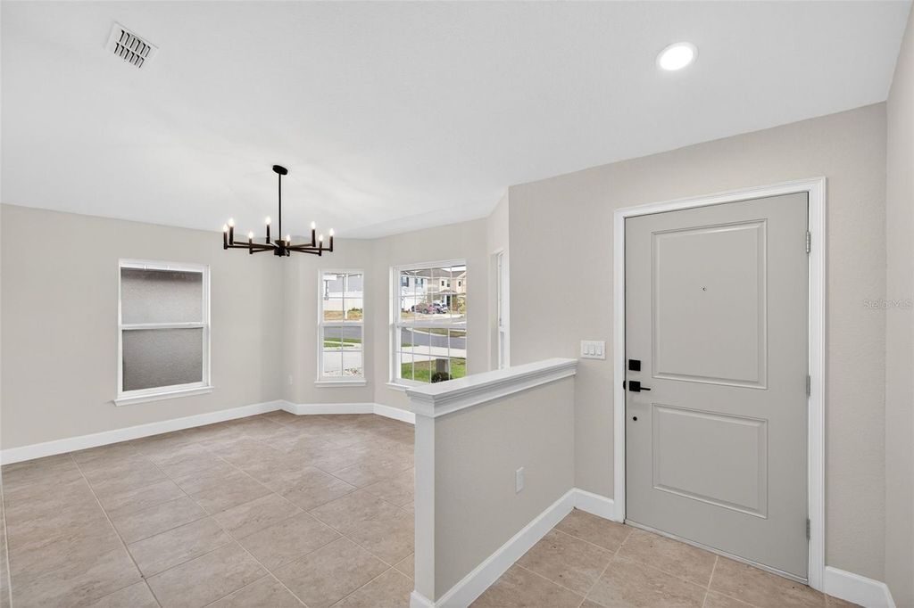Photo of 683 Tanaro Lane, Haines City, FL 33844 (MLS # TB8505645)