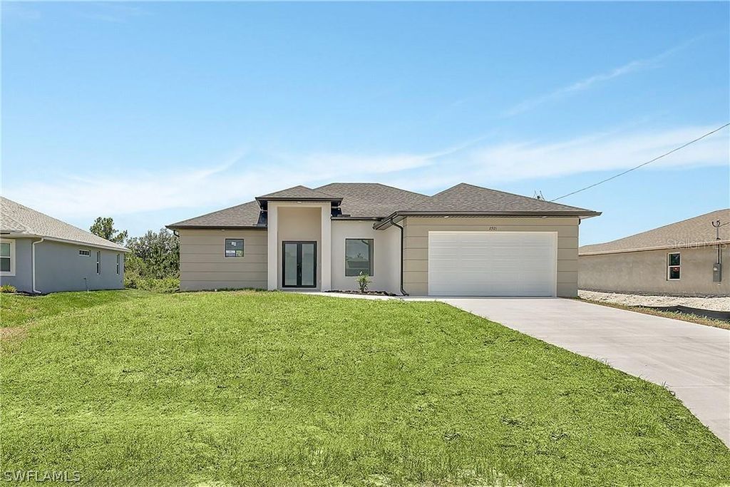 Photo of 2921 7th Street SW, Lehigh Acres, FL 33976 (MLS # S5123956)