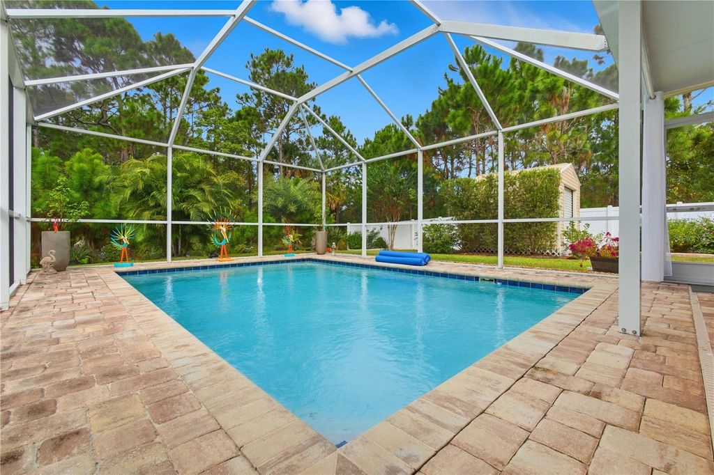 Photo of 14 Frenora Lane, Palm Coast, FL 32137 (MLS # FC313464)