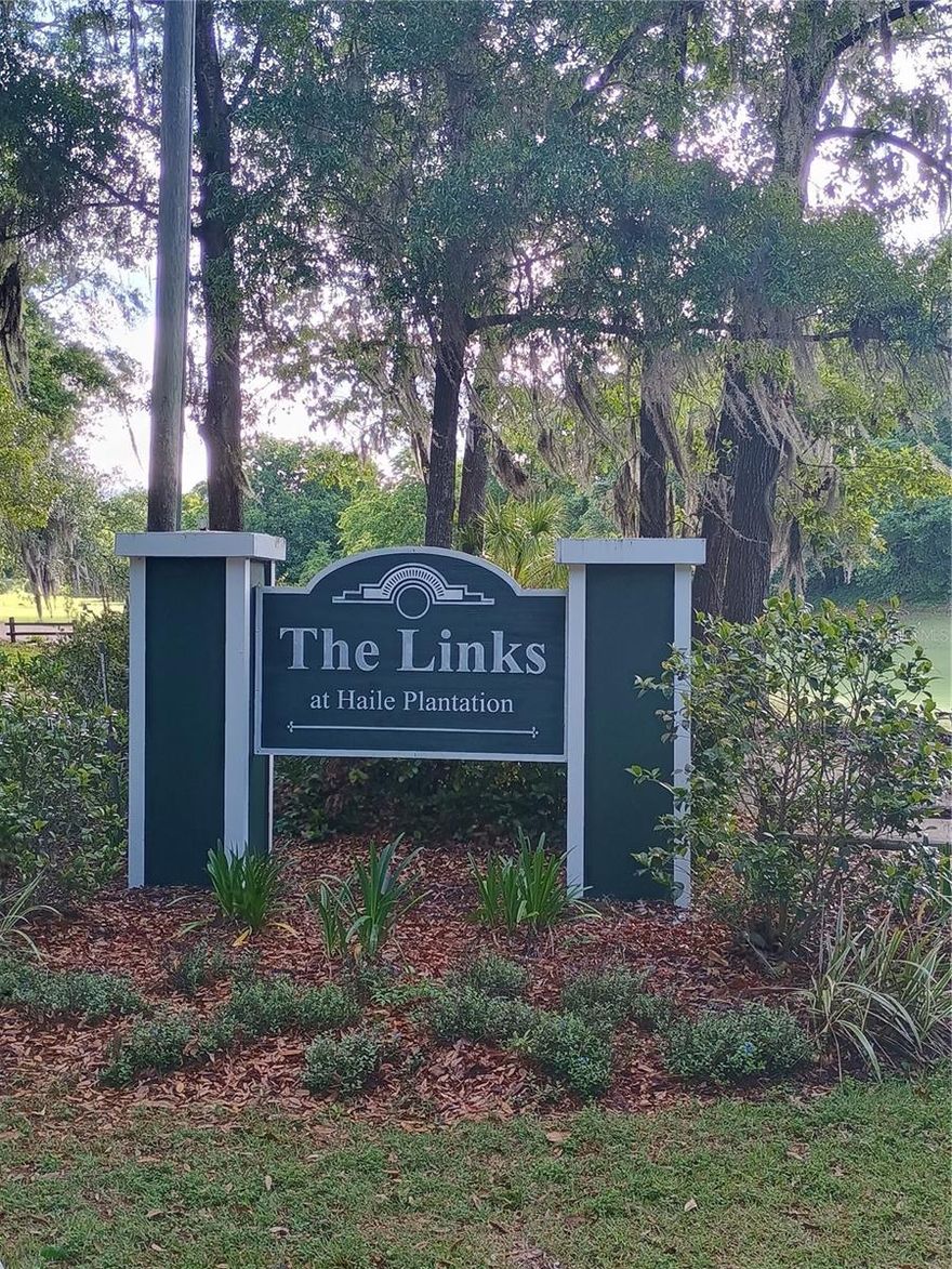 Welcome home to the beautiful community of The Links, where charm and convenience come together. Surrounded by mature trees and abundant wildlife, this neighborhood offers a peaceful setting along with desirable amenities including a fitness center, pool, clubhouse, and scenic sidewalks throughout.  This well-maintained 3-bedroom, 2-bath condo features wood flooring throughout, with cozy carpeting in one bedroom. The kitchen is equipped with stainless steel appliances, and a convenient in-unit laundry closet adds everyday ease. Enjoy high ceilings, ample parking, and a private balcony with a relaxing view.  Ideally located near the heart of the community, this unit provides quick access to all amenities. The neighborhood is golf cart–friendly and just a short drive to Haile Village, where you’ll find dining, shopping, and entertainment. Be sure to check out the popular weekend farmers market—it’s a local favorite!