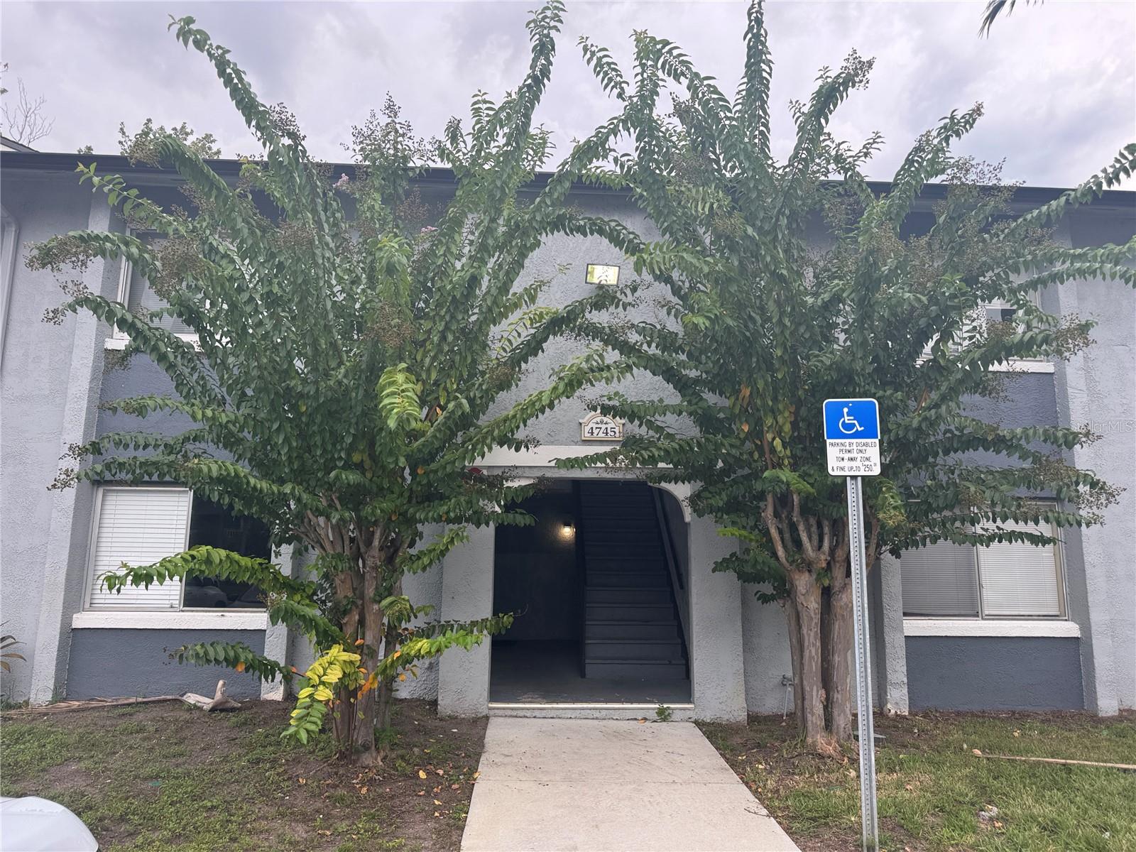 Calling all investors! Explore an exceptional investment opportunity at Millennium Palms Condo in the heart of Orlando! This condo is ideally situated near the Mall at Millenia, Universal Studios, SeaWorld, Downtown Orlando, Disney Springs, popular shopping outlets, and great restaurants. Easy access to major highways, including I-4, 408, FL Turnpike, and John Young Parkway, makes for easy commutes. Orlando International Airport is a short 20 minute drive. This gated community has extensive amenities – two pools, clubhouse, fitness center, car wash area and playground.
The 1-bedroom, 1-bath ground-floor condo features generous living spaces, massive closets, and a quiet screened patio overlooking generous flowering greenery. Granite countertops in the kitchen and bathrooms provide a high end, durable finish. This condo is currently leased at $1,050/month, providing immediate income for the new owner. The current tenant has been in place since January 2022. She is currently on a month to month lease to provide flexibility to prospective purchasers, but she would like to stay.