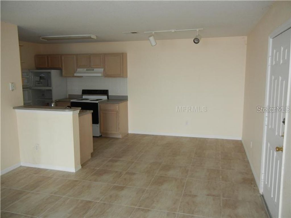 Photo of 7630 Pissarro Drive #16112, Orlando, FL 32819 (MLS # S5140140)