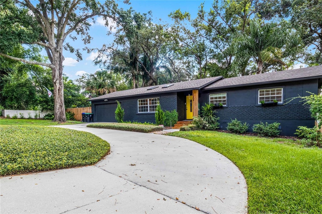 Photo of 2209 Good Homes Road, Orlando, FL 32818 (MLS # O6450778)