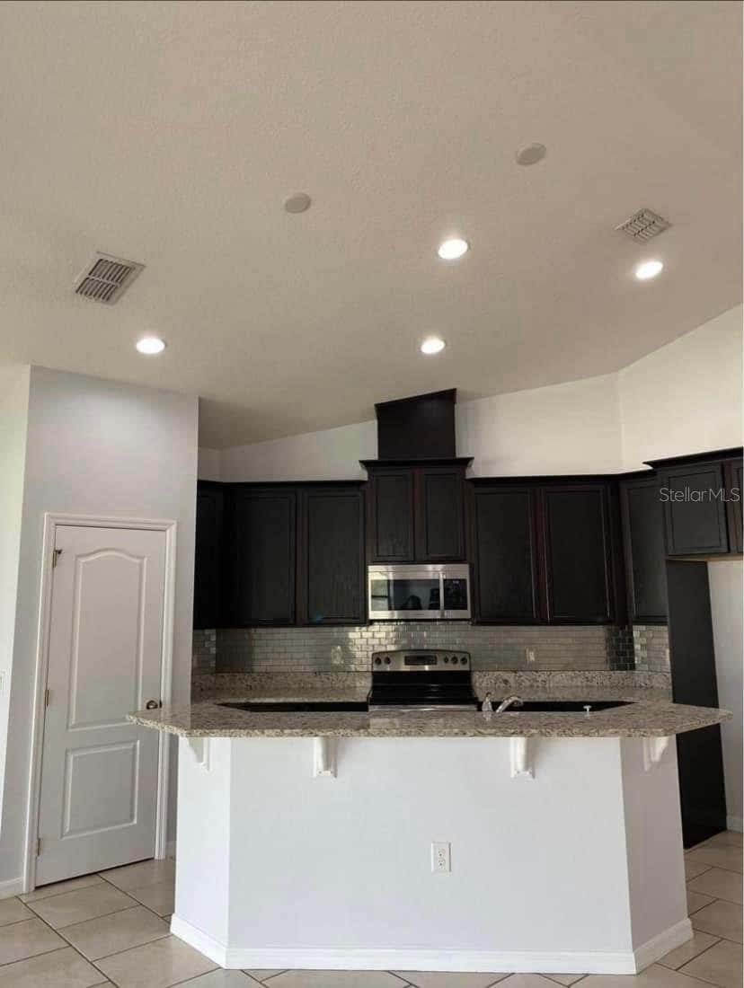 Photo of 5125 Ravena Avenue W, Saint Cloud, FL 34771 (MLS # O6431903)