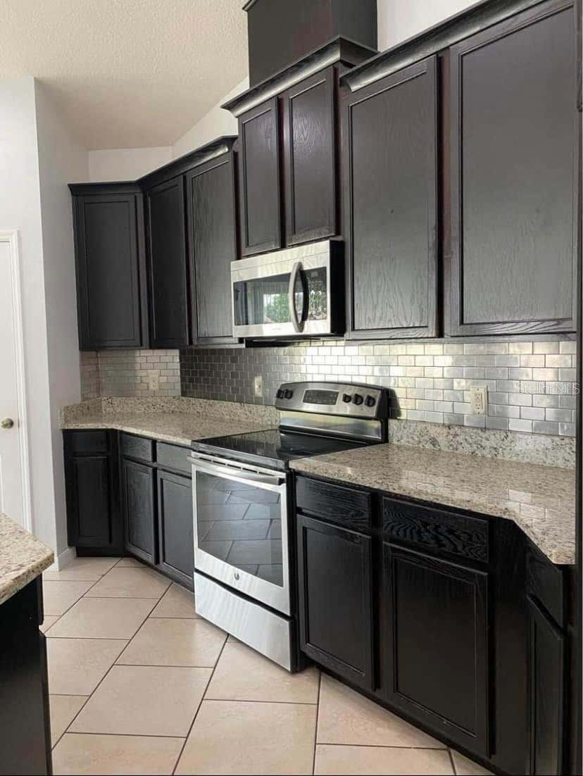 Photo of 5125 Ravena Avenue W, Saint Cloud, FL 34771 (MLS # O6431903)