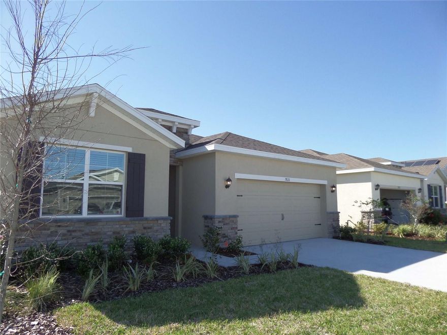 New house conveniently located to The Villages, shopping, restaurants, and nightly live music and dancing. Open concept kitchen with exquisite granite island and countertops with tall cabinets, flows into the great room and dining room. All flooring is tile work, except two bedrooms. The sliding-glass-door lets the light in, and the lanai with waterproof flooring offers a gorgeous area to enjoy morning coffee or tea, or enjoy the evenings. You have upgraded stainless appliances to include all that you expect: 29 cu ft. LG refrigerator, range, microwave, dishwasher, disposer, etc. Master bedroom and three secondary bedrooms are masterfully situated plus premium LG washer and dryer for ultimate convenience. This is a smart home, WI-FI garage door opener, and WI-FI doorbell / camera included. Convenient to The Villages town squares for live music and dancing with open bar every night, and all that is there in Central Florida to enjoy. *** NO AGE-RESTRICTIONS. ***