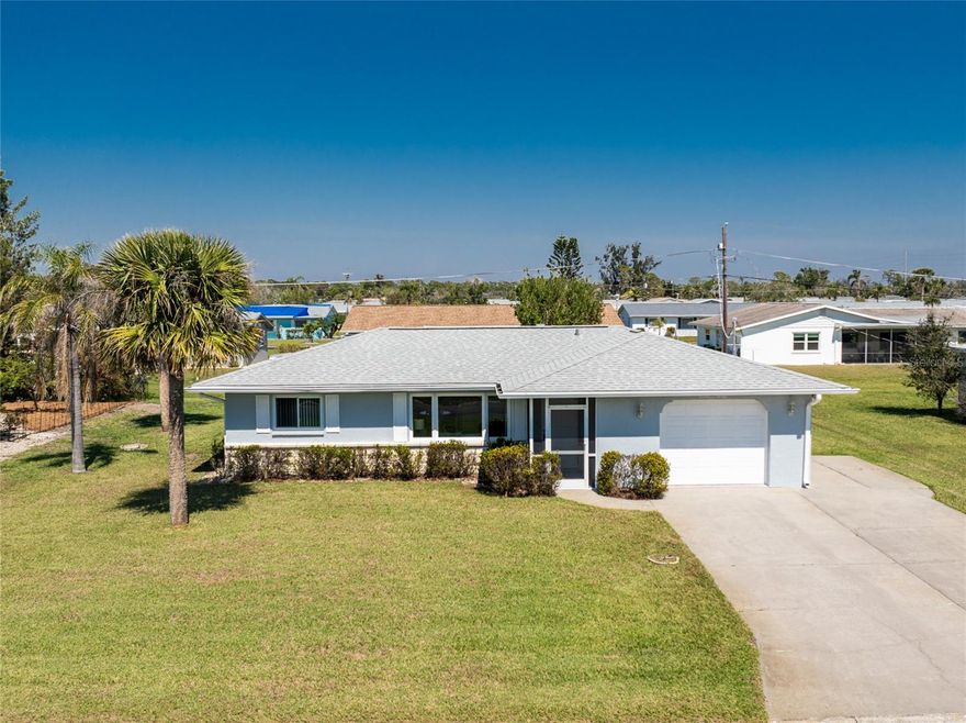 ANNUAL RENTAL! (Also will consider short term seasonal January through April-$3000 per month) Impeccably Updated & Secure Rental in Prime Englewood! Live in comfort and style in this completely renovated 2-bedroom, 2-bath split plan home, complete with a 1.5 car garage and offered fully furnished – just unpack and relax! Located in the desirable heart of Englewood, this residence offers both tranquility and convenience. Step through the welcoming screened front entry into a bright and airy living space, showcasing new plank tile flooring and refined 5 1/4" baseboards. The chef-inspired kitchen features elegant cottage cabinetry, stunning granite countertops, a stylish backsplash, and practical undercabinet lighting. Top-of-the-line GE (double door refrigerator, microwave), Bosch (dishwasher), and Hotpoint (stove) appliances are included. The open flow continues to the comfortable family room, ideal for unwinding and offering sliding glass door access to the private, vinyl-enclosed lanai with a tiled floor and insulated roof, as well as a separate patio for outdoor enjoyment. The primary bedroom provides a serene retreat with a spacious walk-in closet and a beautifully updated ensuite bathroom featuring a quartz vanity, a modern, low-maintenance solid surface shower with safety grab bars, and updated lighting and fixtures. The guest bedroom is equally inviting with a full-width closet and a new ceiling fan and light. The adjacent guest bathroom has also been tastefully renovated with a quartz vanity and new fixtures. Enjoy year-round comfort and significant energy savings thanks to impact windows and a 2022 Tex-Cote COOLWALL infrared heat reflective exterior coating. Recent major upgrades include a new roof in 2023 and a new AC unit in 2024. The property also features a multi-zone irrigation system on a well, ensuring a lush lawn, and a convenient extra-wide driveway with an auxiliary parking pad (10 x 15) and a retractable power sunshade. The 1.5 car garage is equipped with a washer, dryer, utility tub, and an automatic door opener. Prime Location Perks: Enjoy unparalleled convenience with a plethora of amenities within a 2-mile radius, including diverse restaurants, grocery stores, retail options, the YMCA, auto repair shops, pharmacies, banks, a hardware store, and comprehensive medical facilities, including Englewood Hospital. This meticulously maintained and upgraded rental won't last long. Schedule your showing today!