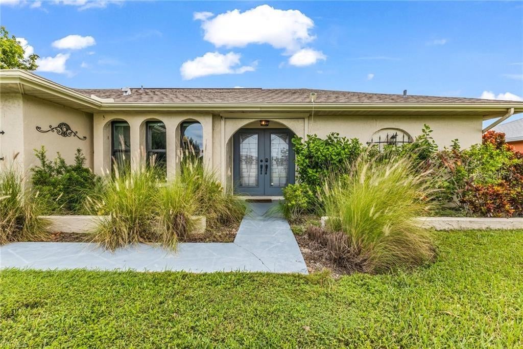 Photo of 216 SE 30th Terrace, Cape Coral, FL 33904 (MLS # C7531431)