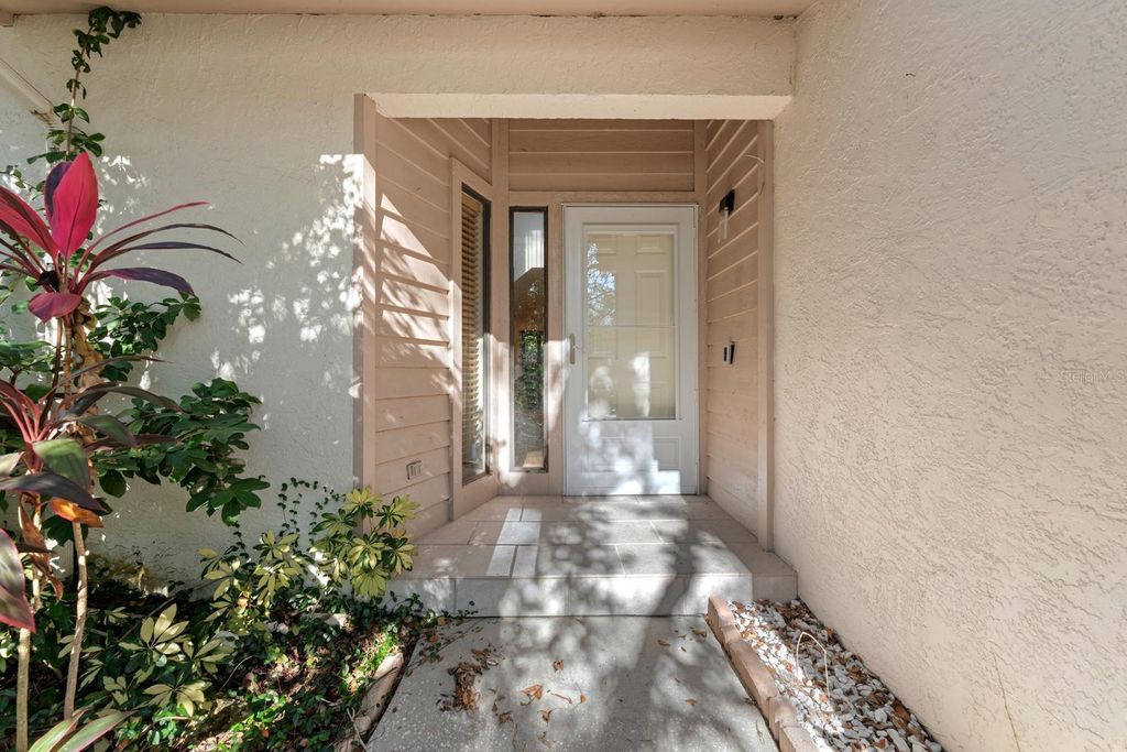 Photo of 1919 Whispering Way, Tarpon Springs, FL 34689 (MLS # TB8456779)