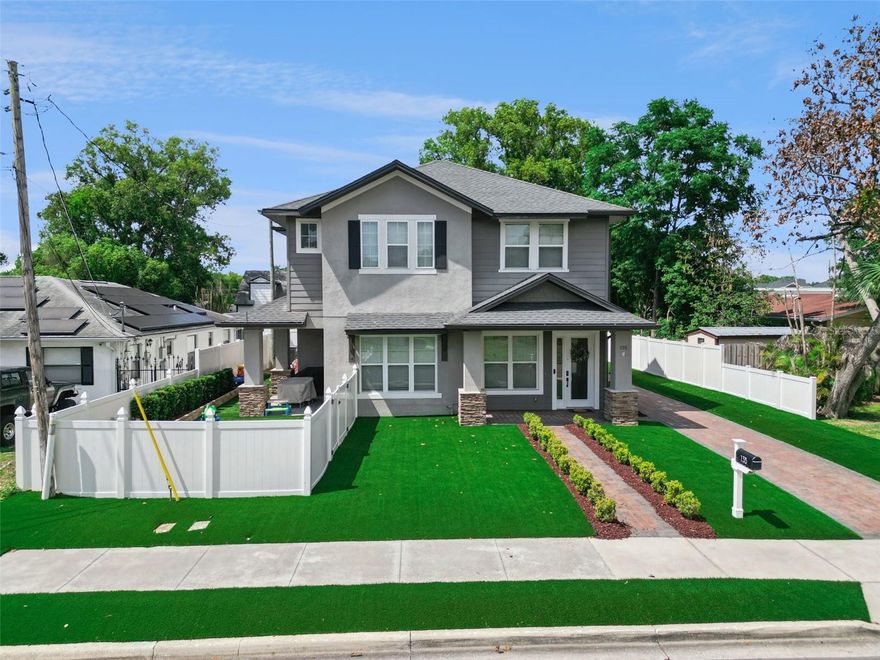 Nestled just south of downtown Orlando in the historic Delaney Park neighborhood and adjacent to the highly desirable SoDo District, this beautifully designed residence offers the perfect blend of modern luxury and urban convenience. Featuring 4 bedrooms, 3 bathrooms, and over 2,100 square feet of thoughtfully designed living space, this home showcases an open and spacious floor plan ideal for both everyday living and entertaining. Designed with a contemporary flair, the heart of the home is the stunning gourmet kitchen, complete with an oversized island, an expansive pantry, upgraded cabinetry, granite countertops, stainless steel appliances, and stylish wood-look tile flooring throughout the main living areas. The luxurious primary suite serves as a private retreat, offering a generous walk-in closet and a spa-inspired bathroom featuring semi-frameless glass showers, custom mirrors, and elevated designer finishes throughout. A conveniently located first-floor laundry room and abundant storage space add both comfort and functionality. Step outside to enjoy the newly installed turf, creating a low-maintenance and beautifully finished outdoor space perfect for relaxing or entertaining. Located just moments from Orlando’s premier dining, shopping, and entertainment, you’ll love being within walking distance to local favorites and only minutes from the vibrant energy of downtown. Enjoy evenings in Thornton Park, scenic walks around Lake Eola, world-class dining, Orlando Magic games and concerts at the Amway Center, weekend visits to the Farmer’s Market, or unforgettable performances at the Dr. Phillips Center for the Performing Arts. This exceptional home offers the best of luxury living in one of Orlando’s most sought-after locations. Reach out to schedule a showing today!