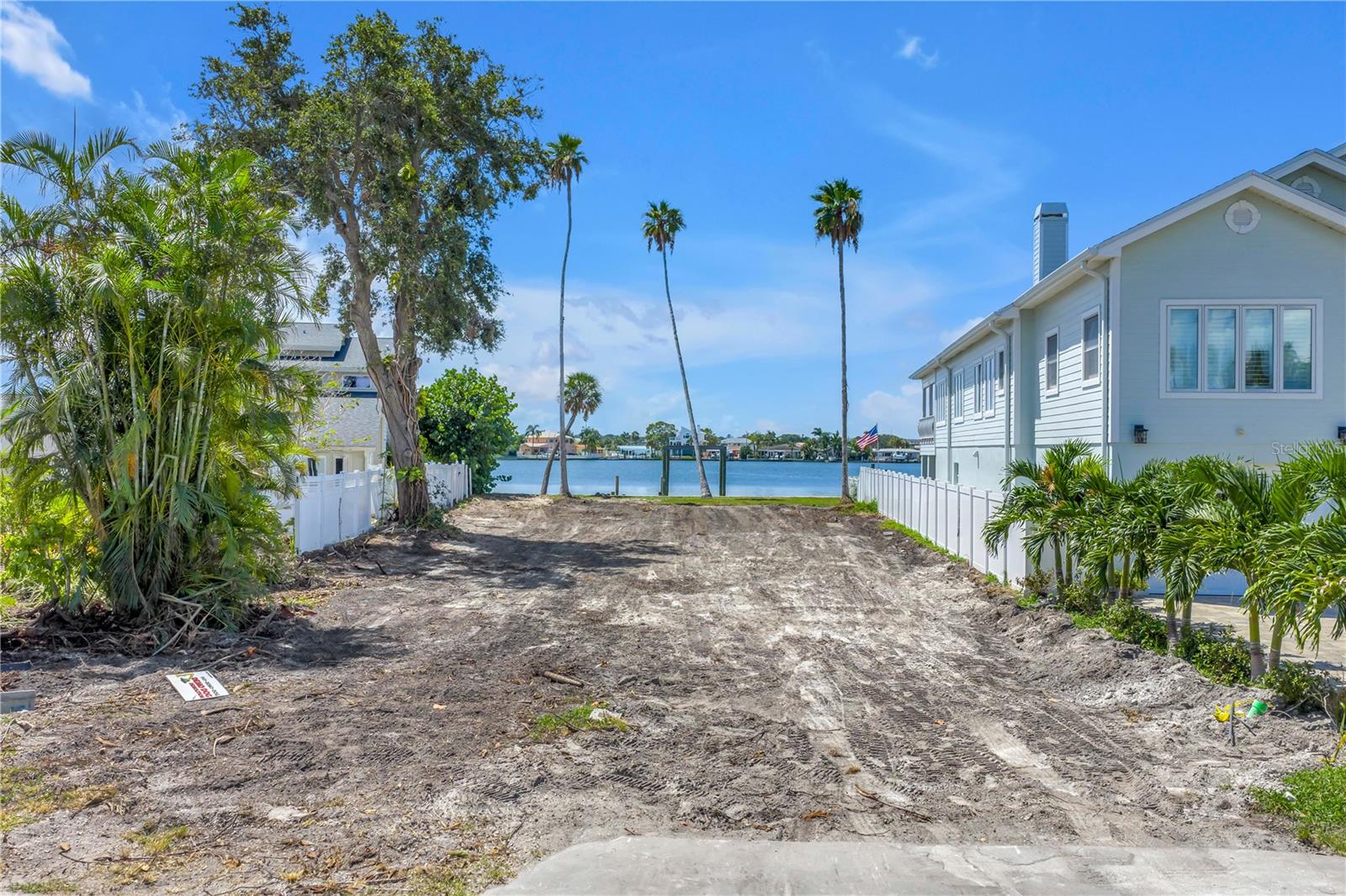 Discover an exceptional opportunity to build your dream home or vacation retreat on this nearly quarter-acre (0.23 acres) cleared and vacant residential lot, just steps from the sugary white sands of Indian Rocks Beach, Nature Preserve & Playground. Tucked away on a quiet cul-de-sac street, this oversized lot boasts approximately 66 feet of width by 175 feet of depth, with 70 feet of direct waterfront access. Enjoy unobstructed southern-facing views across the Intracoastal Waterway, perfect for soaking in the sunrise and sunset skies. With wide open water views, deep water access, and just a short boat ride to the Gulf of America, this property is ideal for boaters and water lovers alike. The City of Indian Rocks Beach permits short-term vacation rentals, making this a rare and lucrative investment opportunity. Whether you're looking to build a private coastal residence or an income-producing vacation property, this parcel offers unmatched size, location, and potential. Don't miss one of the few remaining waterfront lots of this caliber so close to the beach. Bring your builder and start living the Florida dream.