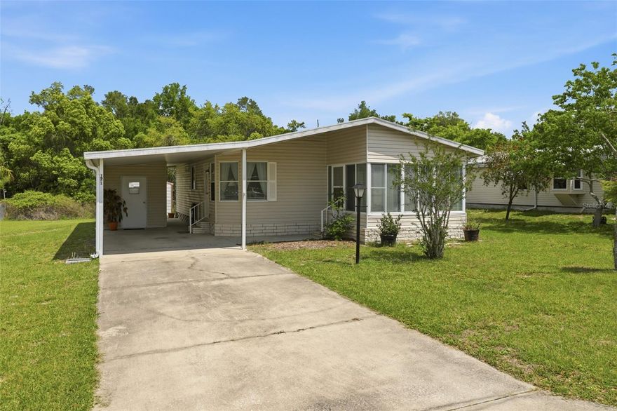 Welcome to this charming and move-in ready 2-bedroom, 2-bathroom manufactured home located in the desirable community of Terra Alta in DeBary! Offering 934 square feet of comfortable living space, this well-maintained home comes fully furnished—making it perfect as a primary residence, vacation getaway, or investment opportunity. One of the standout features of this property is the freedom it provides: Terra Alta is not age-restricted, there is an OPTIONAL HOA, and you own your own land—meaning no lot fees! Enjoy true, affordable homeownership without the extra monthly costs. Inside, the home offers a functional layout with a welcoming living area, a bright kitchen, and two spacious bedrooms, each paired with its own full bathroom for added convenience and privacy. The included furnishings make settling in effortless—just bring your personal touches! Located in a quiet, established neighborhood, overlooking a private wooded lot, this home is just minutes from local shopping, dining, and everyday essentials. With easy access to major highways, commuting is a breeze, and you're less than an hour away from Central Florida’s world-famous theme parks and beautiful beaches. Whether you're looking for affordability, flexibility, or a low-maintenance lifestyle, this Terra Alta gem checks all the boxes. Schedule your showing today!