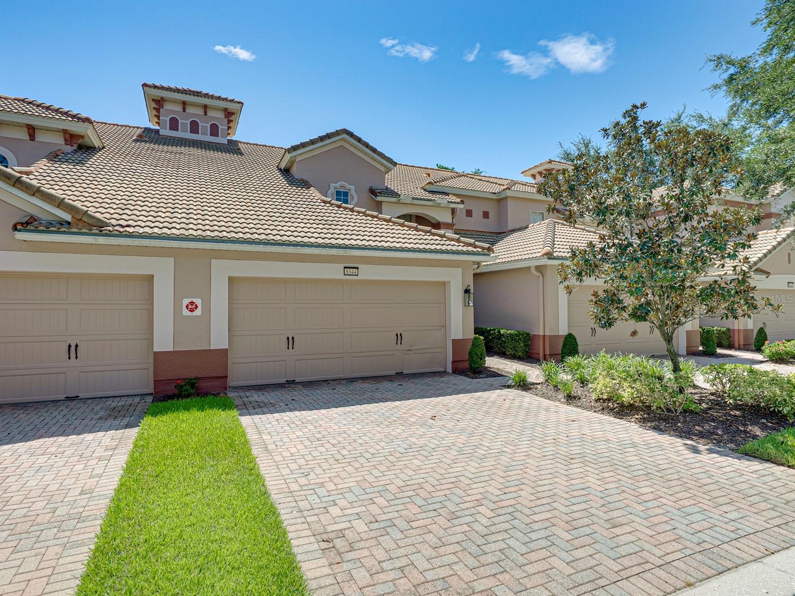 2049 spacious sq. feet full-time home, vacation home, dream home! 7-month minimum on leasing in this community. Drive up through your 24-hr. guard gated community entrance to a fully paved driveway with a large 2-car garage. Front door entry is private and well lighted. Large, screened porch 18 x 7 in the rear overlooks a natural area. Oversized and open living room and dining area with a dinette. The kitchen with granite countertops and stainless-steel appliances, with a large walk-in pantry for storage. Kitchen is open to the living dining room area for conversation while cooking with a granite breakfast snack bar. Intricate detail is given witg cased moldings on the ceiling in the dining room, and beautiful board-and-batten walls. Board-and-batten dressed beautifully up the staircase wall as well. High ceilings both downstairs and upstairs. Overly spacious master bedroom with tray ceilings overlooks the lush with greenery out back. The ensuite bathroom with double sinks is surprisingly large with stand-up shower, soaking tub and private water closet. Behind the ensuite bath, you will there is 19 ft. long master closet. It could be another room, nursery, hideaway it is that big. There is full bathroom and linen closet on the second floor and convenient half bath downstairs for quests or family. Double ceiling fans help to keep you cool in the summer and the sliding glass wall can be opened during the cool months of the year to allow use as an extra room when entertaining. Your new community affords you the typical Del Webb/Pulte resort-style12,500 Sq Fts clubhouse with numerous amenities, pool with one side beach entry the other entry stairs, room for lap swimming, a Jacuzzi, Pergola seating, pool chairs in the sun, and plenty in the shade. Grilling area with tons of seating an outdoor tv, and bar for meeting up with friends to watch the games while at the pool. The Bocce Ball courts and putting green are just steps away. Inside is coffee station, elegantly designed seating areas to gather, a library, a fireplace, a yoga/exercise room, a complete fitness gym. If you are planning a big party or reception there are also banquet/meeting rooms, ping-pong, brilliantly designed billiards room The locker rooms are waiting when your day of fun is done. All of this is covered in your community fees as well as internet, cable, trash, pest control, and care of the exterior of the property as well as landscaping. This is a one-of-a-kind condo community