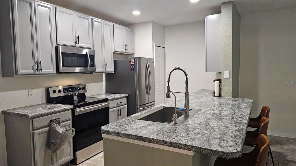 Photo of 5550 E Michigan Street #3110, Orlando, FL 32822 (MLS # O6434016)
