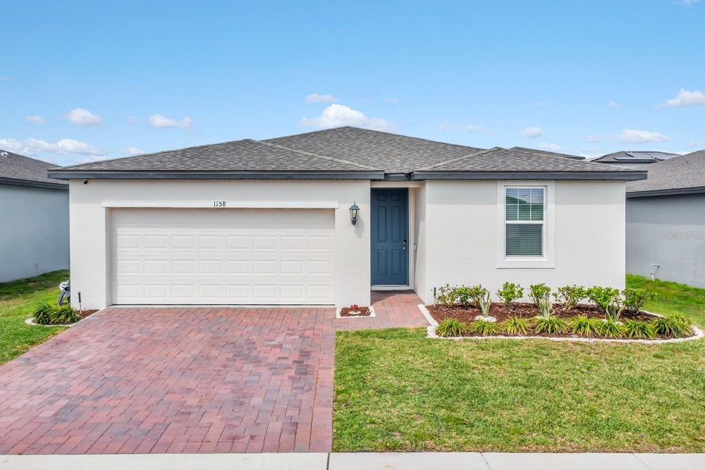Photo of 1158 Foreshore Lane, Haines City, FL 33844 (MLS # O6393629)