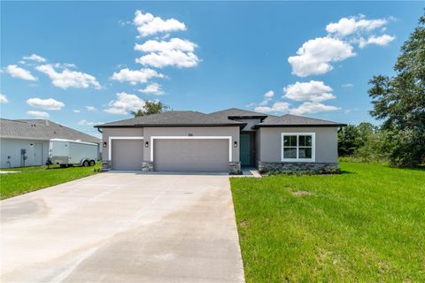 Photo of 506 Marion Oaks Trail, Ocala, FL 34473 (MLS # O6398151)