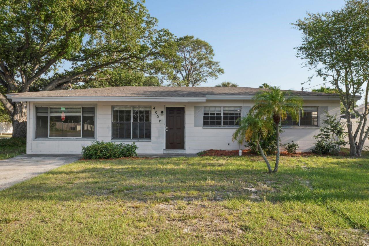 Welcome home! This corner lot home is in a highly desired South Tampa neighborhood just north of MacDill AFB. The area is well-kept, quiet, and has seen a lot of newly renovated homes featured throughout. This beautiful 3 bed 1.5 bath single family home has upgraded flooring and upgraded bathrooms. At approximately 1,200 sq ft, this is a comfortable space with an even more expansive fenced-in backyard. Newer mechanicals as well - HVAC is 2 years old and the water heater is 4 years old. Location is key, and this home is close to major roadways for ease of commute to beaches, restaurants, entertainment, and theme parks. Schedule a showing today and make this house your next home!
