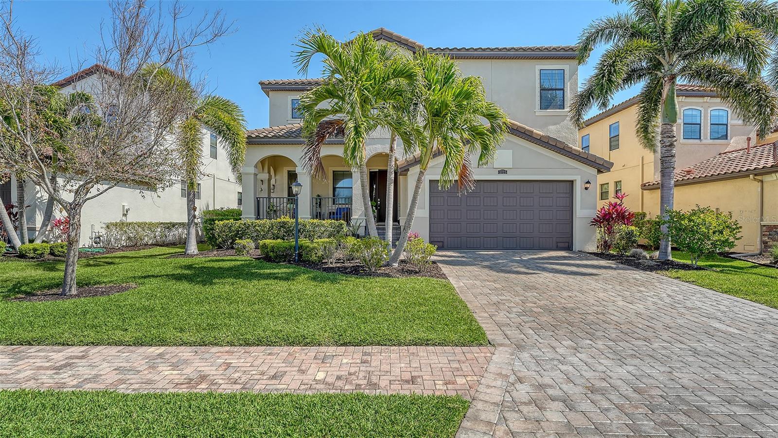 EXCEPTIONAL PRICE REDUCTION!!!
Exquisite 5-Bedroom Home in Gated Legends Bay
Built in 2016, this stunning two-story home in the exclusive, gated community of Legends Bay offers 3,642 sq. ft. of beautifully designed living space. Featuring five bedrooms, four and a half bathrooms, and a private office, this residence provides the perfect blend of elegance, comfort, and functionality.
As you step onto the charming front porch, you are welcomed into a grand foyer with soaring ceilings, leading to a beautifully designed hallway that enhances the home’s spacious feel. The layout flows effortlessly into the private office, elegant dining room, and inviting family room, creating a warm and welcoming atmosphere. Upstairs, a generous loft area provides the perfect retreat for kids to play and unwind. The master suite offers unparalleled privacy, ample space, and a serene ambiance.
Community & Location
Legends Bay is designed for an active and luxurious lifestyle. Enjoy a scenic lakeside pool, where you can take in breathtaking sunsets, and an observation pier overlooking Sarasota Bay, where you can admire stunning wildlife. The picturesque neighborhood loop is perfect for dog walking, biking, jogging, or simply spending quality time outdoors with your family in a safe environment.
Conveniently located just five minutes from IMG Academy, this home is also a short drive to Bradenton’s beautiful beaches, SRQ Airport, and downtown Sarasota. Additionally, the nearby IMG Golf Club and golf-cart-friendly roads make this an ideal location for golf enthusiasts.
With its exceptional design, prime location, and resort-style amenities, this home is truly a rare gem in Legends Bay.