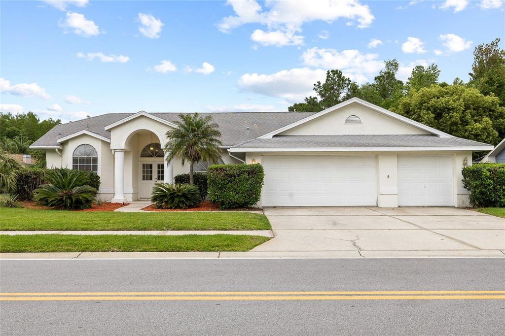 Photo of 1442 Kinsmere Drive, Trinity, FL 34655 (MLS # TB8495978)