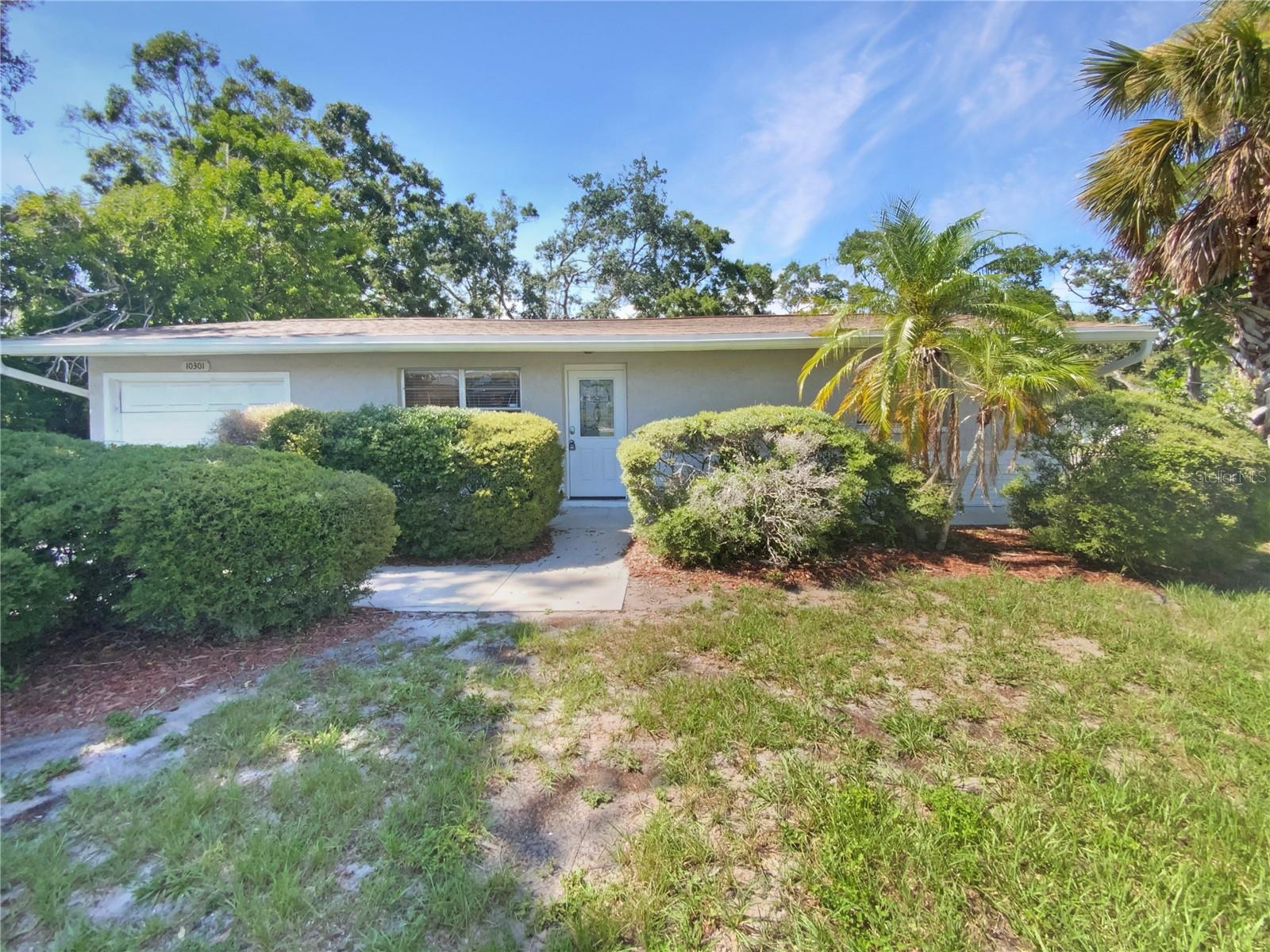 One or more photo(s) has been virtually staged. Welcome home to this charming two-bedroom, one-bath Seminole property! Sleek tile flooring flows throughout the property, which has a new roof. The kitchen features stainless appliances, beautiful counters, and ample cabinetry. A large opening to the living room allows for easy entertaining. Windows create a light filled interior with well placed neutral accents. Enjoy relaxing in the large family room off the kitchen. Head into the backyard onto the patio, the perfect spot to host your next BBQ! Conveniently located, this home is ready for your personal touches. Make it yours today!. 100-Day Home Warranty coverage available at closing