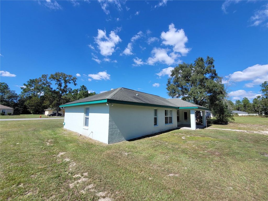 Photo of 7098 SW 131st Loop, Ocala, FL 34473 (MLS # L4956667)