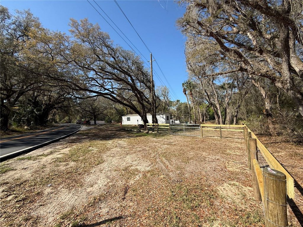 Photo of 7626 SE 183rd Avenue Road, Ocklawaha, FL 32179 (MLS # OM720655)