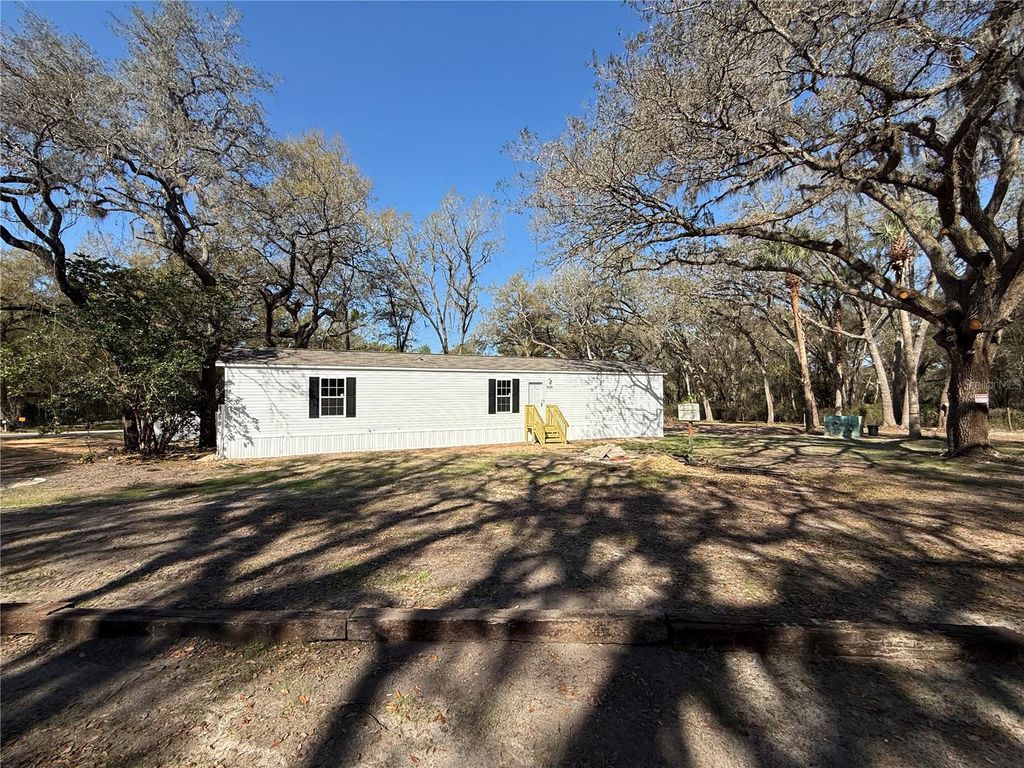 Photo of 7626 SE 183rd Avenue Road, Ocklawaha, FL 32179 (MLS # OM720655)