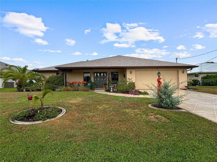 You do not want to miss the opportunity to call this gem yours!!!!! This immaculate lovingly cared for home with STUNNING WATER VIEWS located in the deed restricted community of Rotonda West. This desirable home features TWO MASTER SUITES, a NEW ROOF- installed in 2023, new fence in 2025 and new A/C in 2021. As you approach the home, the tropical landscaping with concrete curbing, stone and well-manicured lawn welcome you to the 20' x 7' tiled front porch and double door entry.Step inside to the spacious living room with a subtle blue color scheme, neutral easy to maintain tile flooring that continues throughout most of the home and nicely flows into the kitchen and dining area-- the ideal layout for hosting dinner parties and entertaining guests! The galley style kitchen is a DREAM with ample cabinets, counter space and a built-in desk area, plus a pantry to ensure you have PLENTY of storage--all of which is open to the dining area and sliding glass doors that lead out to the impressive enclosed lanai so you can expand your living area outside. The 26' x 12' carpeted lanai offers the perfect space for relaxing and entertaining with two ceiling fans, and sliding windows with screening that you can open up for that nice Florida breeze--and most importantly, the tranquil water views that you can admire from your very own backyard. Inside there is plenty of room for everyone with the added privacy of the "split" bedrooms- TWO sizeable MASTER SUITES, one with newly nstalled (4/2024) laminate flooring, walk-in closet with cedar walls, a tray ceiling and your own private door that leads to the lanai along with an ensuite bath with dual sinks, shelving and a tiled shower with frosted glass doors a pocket door for added privacy. The second ensuite offers the same spacious bedroom with plush carpeting and cedar walled walk-in closet with the ensuite bath featuring a walk-in shower, large vanity and wire shelving for your towels and linens. The roomy third bedroom will easily accommodate any guest with a built-in closet, ceiling fan and the same easy to maintain tile flooring to match the rest of the home. The laundry room has a sizable sink and provides more storage space with a closet/pantry and provides access to the double car garage with plenty of space for your cars and tools. Enjoy the bonus of the canal-fed irrigation system (with all new sprinkler heads) and the peace of mind with this property being located in an "X" Flood Zone. This property is a RARE find with amazing features, waterviews and location. Rotonda West offers 5 golf courses, waterways for fishing and kayaking, walking trails, and close to tennis & pickleball courts plus the luxury of beautiful Florida beaches, shopping, and dining just minutes away!