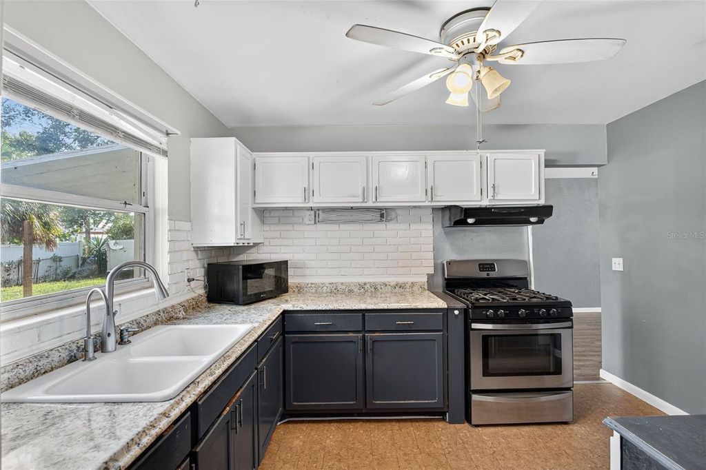 Photo of 1557 79th Avenue N, St Petersburg, FL 33702 (MLS # TB8409361)