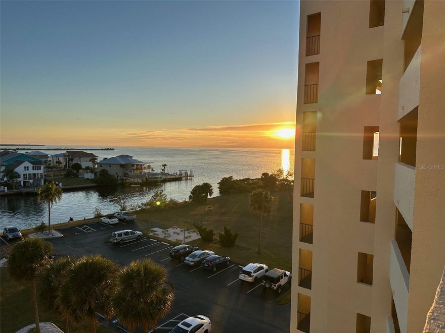 Gulf Front Condo!! Fifth Floor, 1 bedroom, 1 bath unit with the best views of the Gulf all day long and superb at sunset!! Two sliders leading to balcony overlooking private lagoon with views of the Gulf beyond that AND out the front door also! Tile flooring in wet areas and luxury vinyl everywhere else. This unit includes it's own designated parking spot AND storage unit under the building. Gulf Island Beach & Tennis Club is accessed through a manned security gate and has a clubhouse, heated pool, gym, tennis/pickleball courts, a beach area and much more! Easily have an active social life here right at home!  This unit is mostly original, but has NEVER been lived in! AC  water heater, toilet, and vinyl flooring have been replaced. There is fresh paint and ALL furnishings are included!  Just move in and LIVE THE EASY LIFE ON THE WATER!!