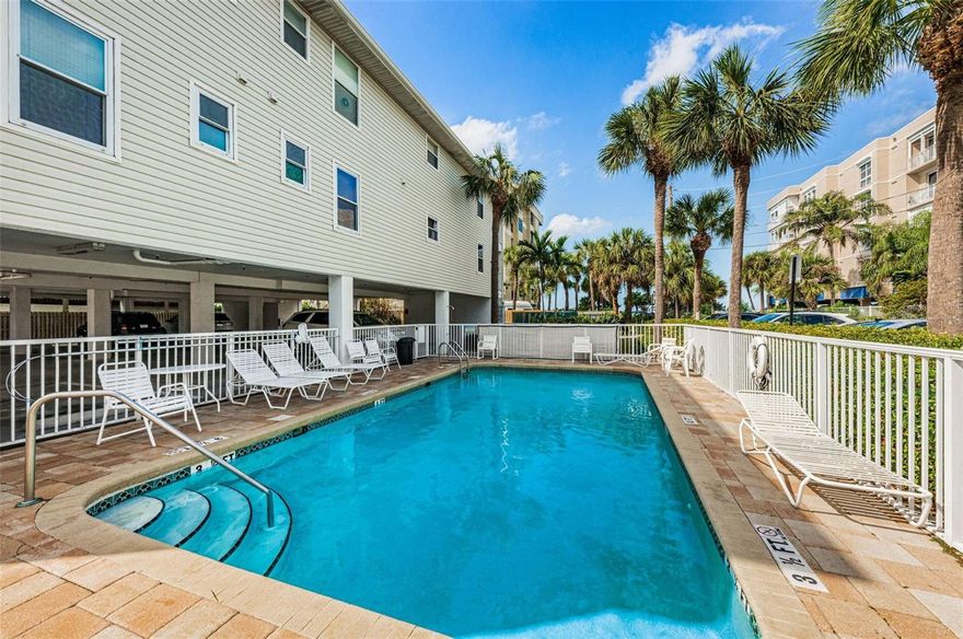 Beautifully updated and modern 2BR/2BA condo located in desirable Beachside Villas at Indian Rocks Beach. This spacious second-floor unit (no elevator) offers approximately 1,000 sq ft of stylish living space with an open floor plan and coastal-inspired décor. Just steps from the beach, the property features a private balcony, community pool, and convenient beach access down the street. The primary suite includes a queen bed and private bath with walk-in shower. The second bedroom features a twin-over-full bunk bed and is adjacent to a hall bath with shower/tub combo. The living area offers a large sectional sleeper sofa, oversized flat-screen TV, and direct balcony access. The updated kitchen is fully equipped with quartz countertops, new stainless steel appliances, dishwasher, and ample cabinetry, plus additional bar seating for three. The dining area accommodates four. Additional highlights include new flooring, updated kitchen and baths, modern furnishings, stackable washer/dryer, and WiFi throughout. Ideal for those seeking a turnkey coastal retreat or investment opportunity in the heart of Indian Rocks Beach, just moments from the sand and Gulf waters.