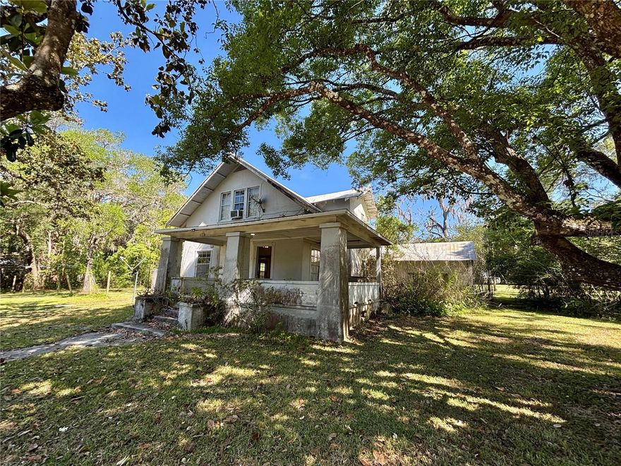 HISTORIC CHARM!! ONE OF A KIND OPPPORTUNITY!! Sits on a 1 acre lot where there is NO HOA and NO FLOOD ZONE. Electricity and Plumbing Connected. Ready to be Renovated!! Property is fenced in and gated. You're only a few minutes away from downtown Brooksville with restaurants, antique shops, and plenty of areas to walk around on those beautiful Florida days! Spacious Living Room with a Wood Stove plus FOUR, Large Bedrooms. Primary Bedroom is on the FIRST Floor. This property has some cleared land to host various, family/friend gatherings, PLUS there are many trees, including fruit trees. Privacy on the lot and there is ample space between you and your neighbor!! Public Water and Septic Tank! Cash ONLY!!