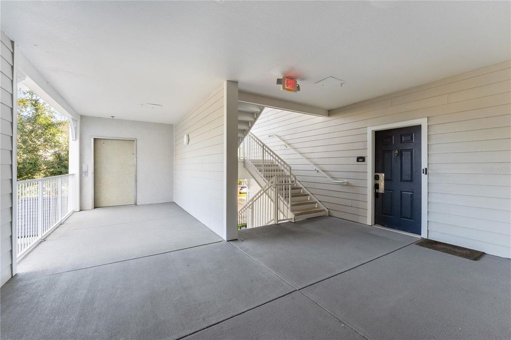 Photo of 3174 Feltrim Place #201, Kissimmee, FL 34747 (MLS # O6393047)