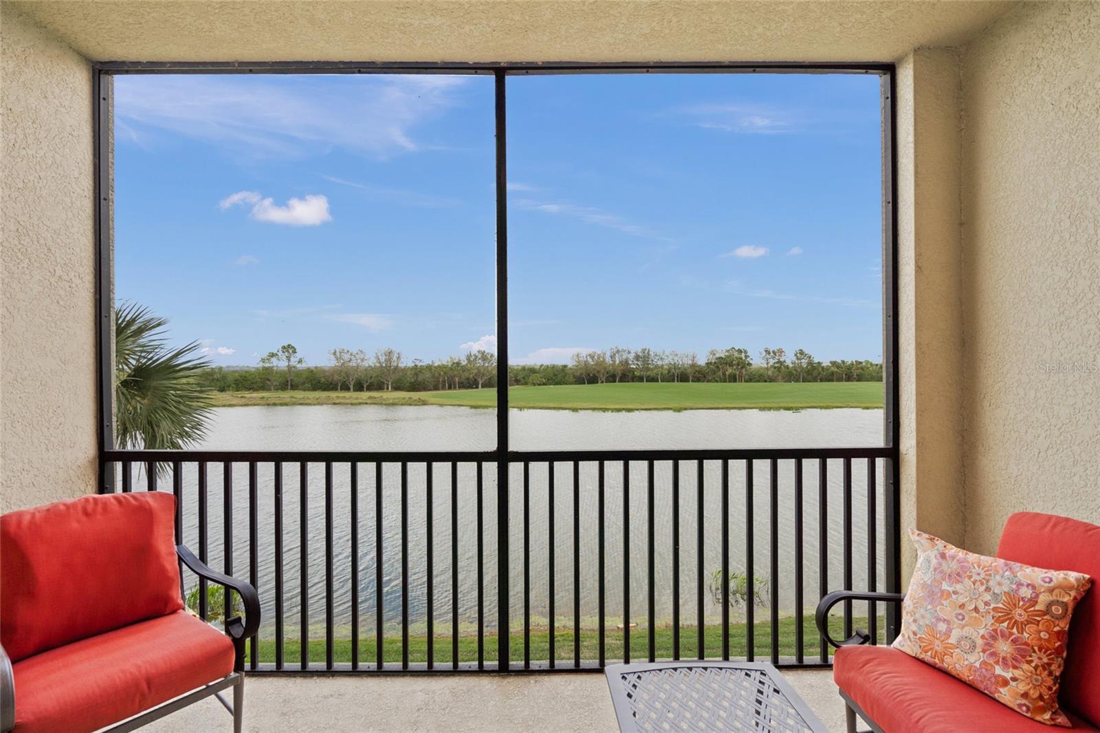 Priced below most recent sales AND GOLF INCLUDED! Nestled in the heart of River Strand Golf & Country Club, this beautifully appointed second-floor condo offers an unparalleled blend of natural beauty, tranquility, and resort-style living. With breathtaking panoramic views of the golf course, a serene pond, a lush preserve, and the distant Manatee River, this home is a haven for nature lovers. Wake up to the soothing sounds of birds and enjoy stunning sunsets from your private, south-facing lanai featuring ceramic tile layed on the diagonal.
This turnkey furnished, golf-deeded condo is designed for comfort and convenience. The open-concept living and dining areas are bright and airy, with neutral tones and elegant crown molding. The fully equipped kitchen features all-wood cabinetry, granite countertops, stainless steel appliances, and a charming breakfast nook. A split floor plan ensures privacy, with the spacious primary suite offering two walk-in closets, spectacular water views, and an en-suite bath with a walk-in shower. The guest bedroom, currently arranged with twin beds, is conveniently located across from the guest bath with a tub-shower combination.
Additional highlights include a state-of-the-art air conditioning unit with upgraded UV filter installed in 2021, a brand new 2024 hot water heater, brand new neutral paint throughout entire condo, freshly cleaned ceramic tile flooring, a brand-new dishwasher, BRAND NEW carpets in both bedrooms, and an indoor laundry room with a full-size washer and dryer. Nearly every room in the home is designed to showcase the breathtaking natural surroundings.
Situated close to the elevator for easy access, the unit also includes a large storage room directly across from the front door that is secure and perfect for bicycles and golf clubs as well as a covered carport. The condo fees cover cable, high-speed internet, water, sewer, and trash, with electricity being the only additional utility. Additionally condo can be rented for a minimum of 30 days, 12 times per year making it a great part time residence with income potential or of course enjoy it full time for yourself!
River Strand Golf & Country Club is an amenity-rich, gated community offering a 27-hole Arthur Hills-designed golf course, Har-Tru tennis courts, pickleball courts, resort-style pool with a lazy river and Tiki Bar and additional satellite pools one of which is within walking distance to the condo, a clubhouse with a restaurant and bar, social events, a community center, and two expansive fitness centers. With 24-hour security and exterior maintenance included, this is truly a worry-free lifestyle. Assessment for the beautiful renovation of the clubhouse and restaurant has been PAID IN FULL by the seller! The prime location offers easy access to I-75, Costco, and the upcoming Target, Whole Foods, and Hobby Lobby. A short drive takes you to the UTC shopping and dining corridor, downtown Sarasota, Bradenton, and the world-renowned Gulf beaches of Siesta Key, Lido Key, Longboat Key, and Anna Maria Island.
Experience the ultimate blend of natural beauty and luxury living. Schedule your private tour today and discover why River Strand is more than a community—it’s a lifestyle. Condo is being sold turnkey furnished but furniture can be removed if desired.
