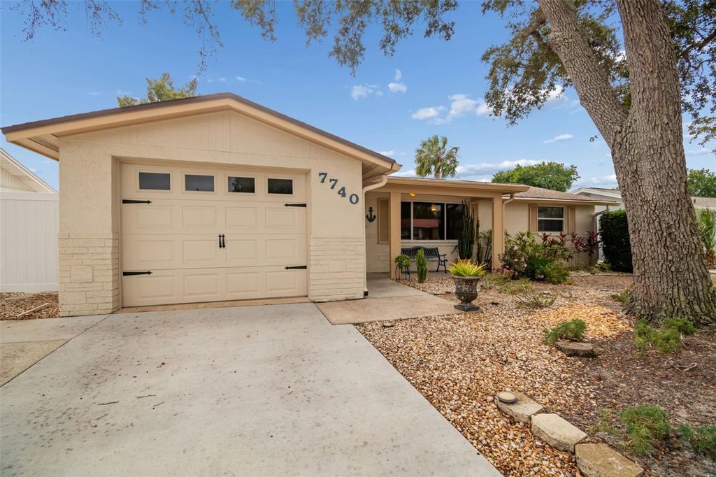 Photo of 7740 Hawthorn Drive, Port Richey, FL 34668 (MLS # TB8470203)